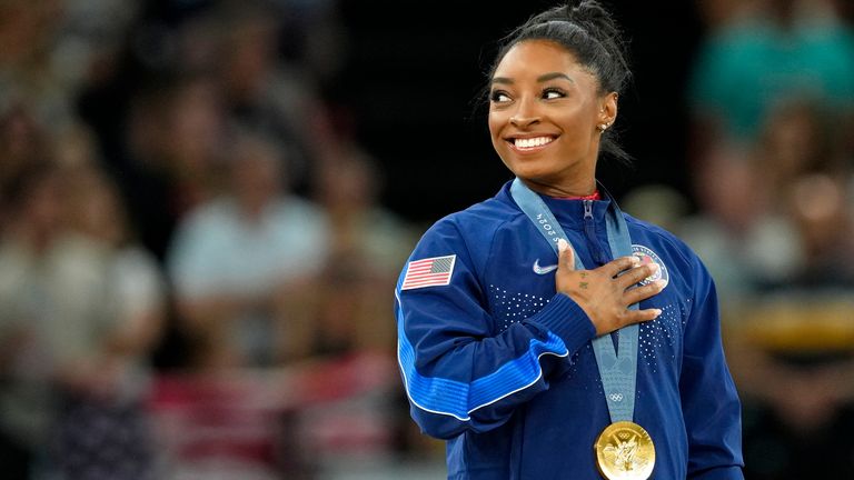 Aug 3, 2024; Paris, France; Simone Biles of the United States during the national anthem with her gold medal during the medal ceremony for the vault on the first day of gymnastics event finals during the Paris 2024 Olympic Summer Games at Bercy Arena. Pic: Reuters 