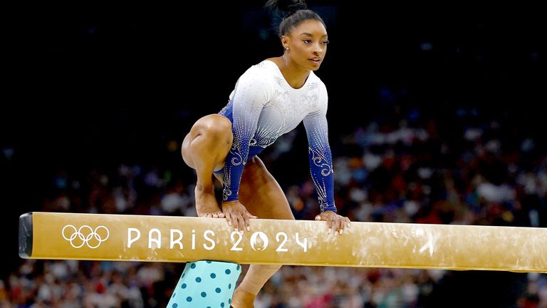 Simone Biles after falling off during her performance. 
Pic: Reuters