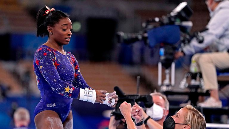 Jul 25, 2021; Tokyo, Japan; Simone Biles (USA) reacts after competing on the uneven bars in the womens gymnastics qualifications during the Tokyo 2020 Olympic Summer Games at Ariake Gymnastics Centre. Pic: Reuters