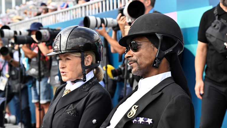 Paris 2024 Olympics - Equestrian - Dressage Team Grand Prix Special - Chateau de Versailles, Versailles, France - August 03, 2024. U.S. rapper Snoop Dogg watches the Dressage Team Grand Prix Special Henrik Montgomery/TT News Agency via REUTERS ATTENTION EDITORS - THIS IMAGE WAS PROVIDED BY A THIRD PARTY. SWEDEN OUT. NO COMMERCIAL OR EDITORIAL SALES IN SWEDEN.