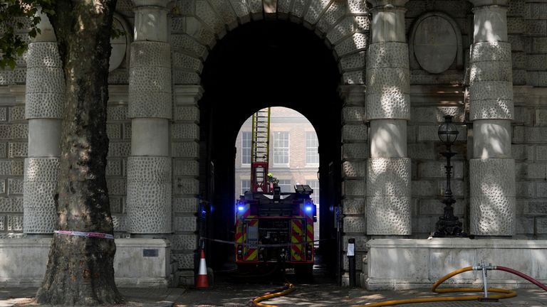 Firefighters fight the fire. Image: Reuters