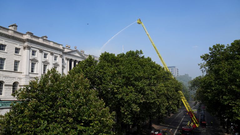 The fire was in the building's roof. Pic: Reuters