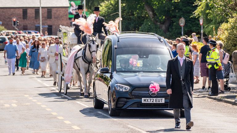 The horse-drawn carriage carrying the coffin of Southport stabbing victim Alice da Silva Aguiar arrives for her funeral at St Patrick's Church, Southport. The nine-year-old died in a knife attack at a dance class in Southport on July 29. Photo date: Sunday, August 11, 2024. Photo date: Sunday, August 11, 2024.