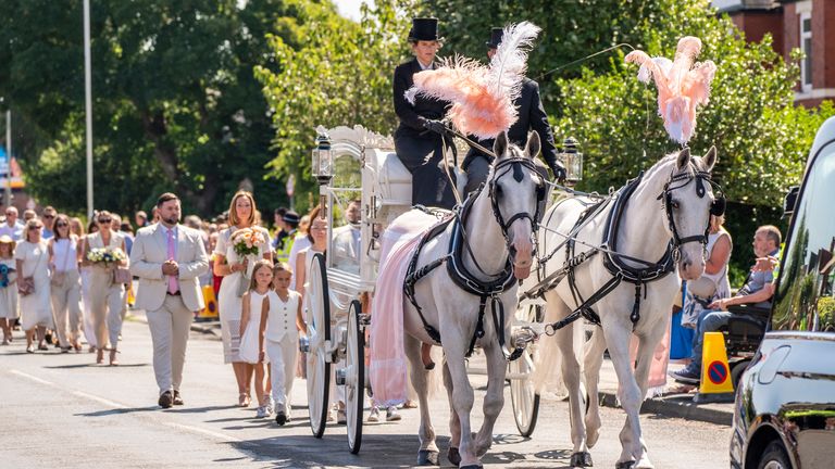 The horse-drawn carriage carrying the coffin of Southport stabbing victim Alice da Silva Aguiar arrives for her funeral at St Patrick's Church, Southport. The nine-year-old died in a knife attack at a dance class in Southport on July 29. Photo date: Sunday, August 11, 2024. Photo date: Sunday, August 11, 2024.