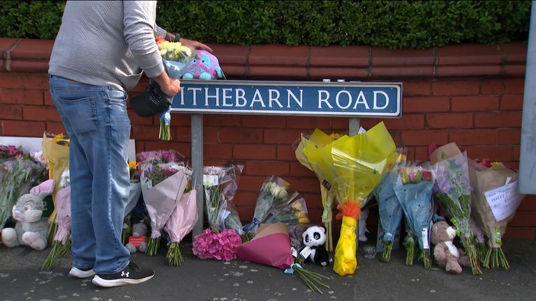 A makeshift memorial was held for the three girls on Hart Street in Southport.