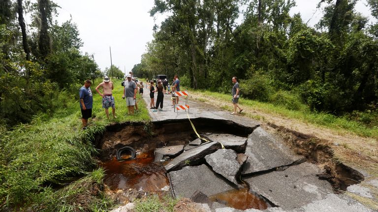 A large sinkhole opened up on Grange Fall Loop in Wimauma in Florida after Debby made landfall in the state as a hurricane. Pic: Reuters