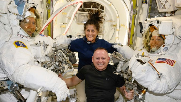 FILE - In this photo provided by NASA, Boeing Crew Flight Test astronauts Suni Williams and Butch Wilmore, center, pose with Expedition 71 Flight Engineers Mike Barratt, left, and Tracy Dyson, aboard the International Space Station's Quest airlock on June 24, 2024. Officials said Thursday, July 18, there...s still no return date for Williams and Wilmore, who have been at the International Space Station since June 6. (NASA via AP, File)