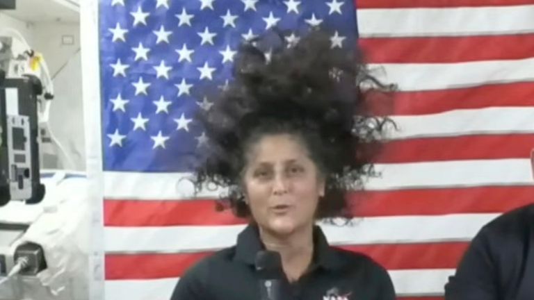 Suni Williams presents her space hairstyle during a press conference in July. Image: AP