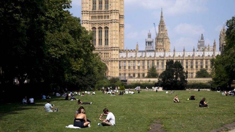 People enjoy the warm weather at Victoria Tower Gardens in Westminster, London.  Thunderstorms and hail are expected to hit parts of the UK on Thursday as temperatures reach 30C.  Photo date: Thursday, August 1, 2024.