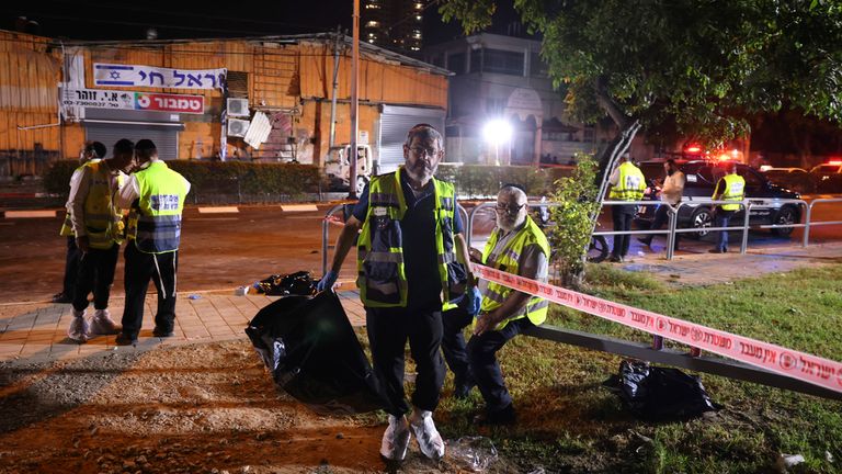 Emergency workers at the scene on Sunday night. Pic: AP