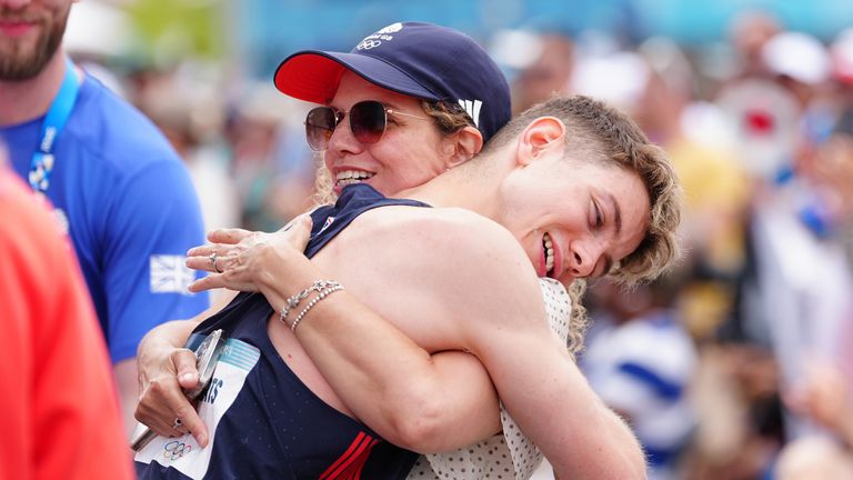 Toby Roberts celebrates with mum Marina after winning gold.
Pic: PA