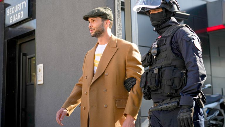 Tristan Tate being escorted by police on Wednesday. Pic: AP