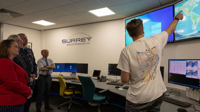 Personnel from UK Space Command and Defence Equipment and Support (DE&S) are briefed about the processes of the Satellite Launch by Chris Youens (Spacecraft Operations Manager) in the Operations Room at Surrey Satellite Technology ltd (SSTL) in Guildford on the 16/08/24...A UK satellite to support military operations was successfully launched into space last night. .Tyche, is the first UK Space Command satellite which can capture daytime images and videos of the Earth...s surface.... .Tyche was launched from Vandenberg Space Force Base, California, by SpaceX, on their reusable Falcon 9 rocket, as part of the ...Transporter 11... mission........The satellite will strengthen the UK...s Intelligence, Surveillance, and Reconnaissance (ISR) capabilities....... .Tyche is the first satellite to be launched under the Ministry of Defence...s space-based ISR programme, which will deliver a constellation of satellites and supporting ground systems by 2031........These satellites will not only support military operations, but also contribute to other government tasks, including natural disaster monitoring, the development of mapping information, environmental monitoring and tracking the impact of climate change around the world....... .Designed and built in the UK through a ..22 million contract awarded by Defence Equipment & Support to Surrey Satellites Technology Limited (SSTL), Tyche is the first satellite to be fully owned by the Ministry of Defence.... The design and build of the 150-kilogramme satellite has supported around 100 high-skilled roles at SSTL since 2022........Operating in Low Earth Orbit over a five-year lifespan, Tyche will provide timely space-based imagery in support of the UK Armed Forces. .