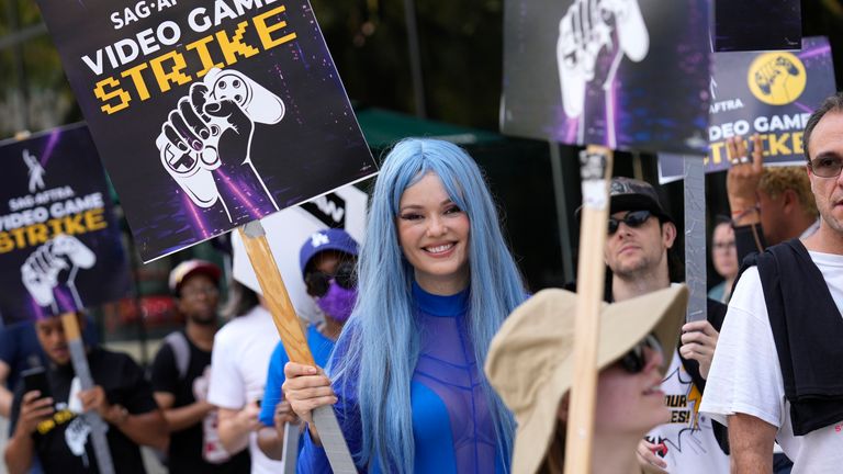 Actress Natasha Blasick at the picket line at Warner Bros. Games headquarters.  Photo: AP