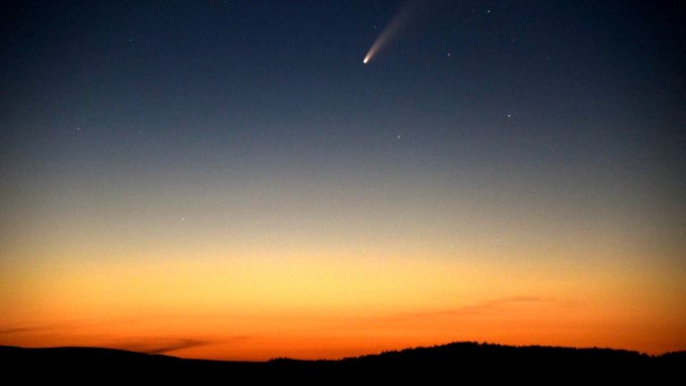 A comet over Tregaron in Wales. Pic: Dafydd Wyn Morgan/Cambrian Mountains Initiative