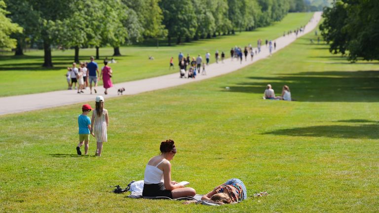 People enjoying the warm weather in Windsor. Pic: PA