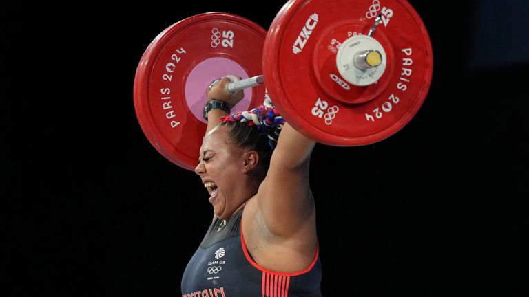 Emily Campbell of Britain competes during the women's +81kg weightlifting event at the 2024 Summer Olympics, Sunday, Aug. 11, 2024, in Paris, France. (AP Photo/Kin Cheung)