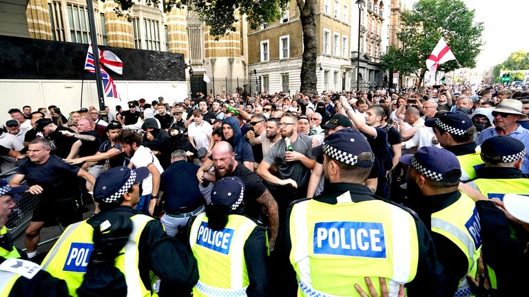 Police officers clash with protesters during the 'Enough is Enough' protest in Whitehall, London, following the fatal stabbing of three children at a Taylor Swift-themed holiday club on Monday in Southport. Picture date: Wednesday July 31, 2024. PA Photo. See PA story POLICE Southport. Photo credit should read: Jordan Pettitt/PA Wire 