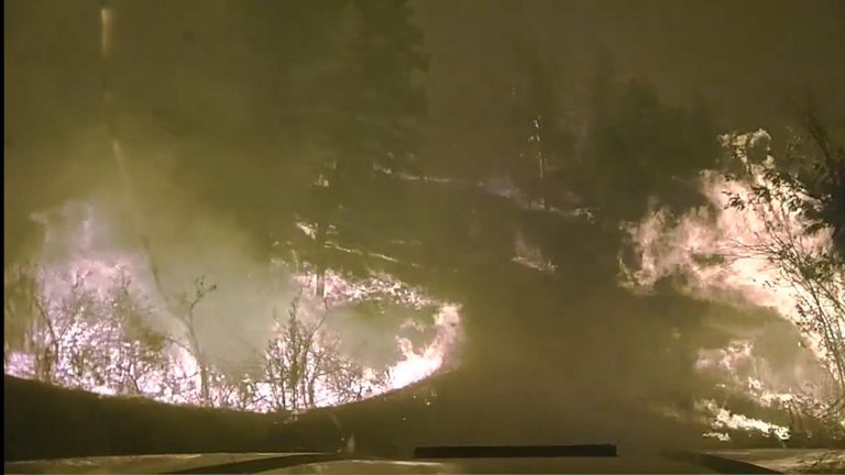 Watch: Police drive through flaming Montana countryside