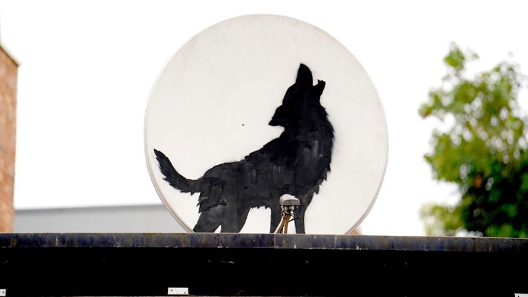 A new artwork depicting a howling wolf unveiled by Banksy in Peckham.
Pic: PA