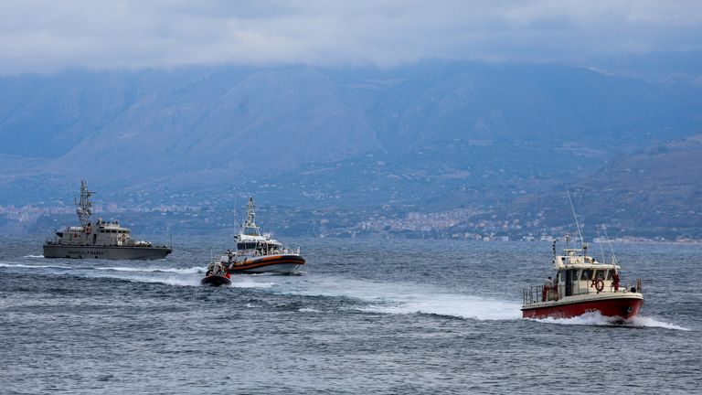 Rescue boats take part in a search operation, after a luxury yacht, which was carrying British entrepreneur Mike Lynch, sank off the coast of Porticello, near the Sicilian city of Palermo, Italy, August 21, 2024. REUTERS/Louiza Vradi