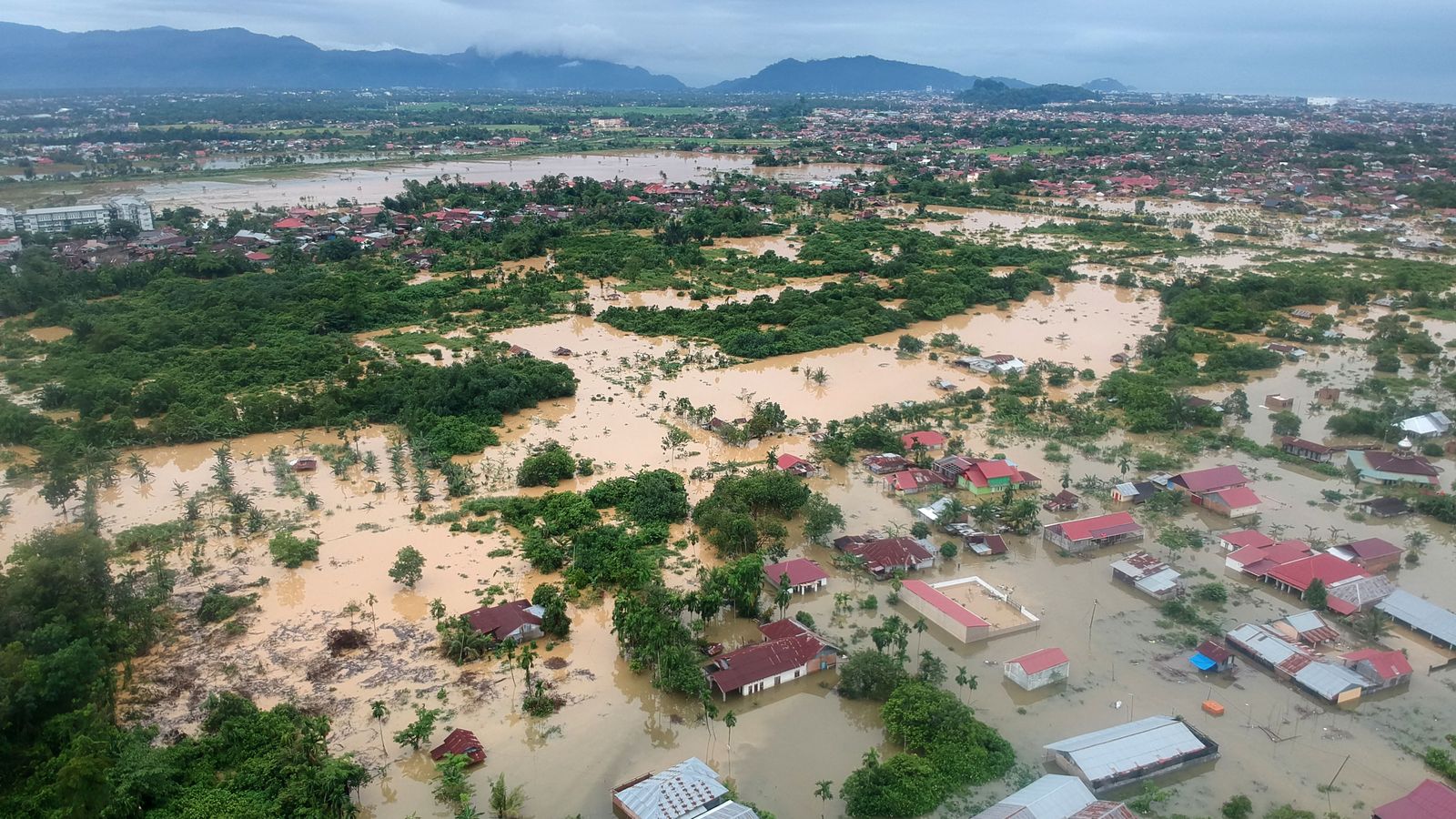 Landslide in Indonesia kills at least 15 people and leaves dozens buried at illegal gold mine