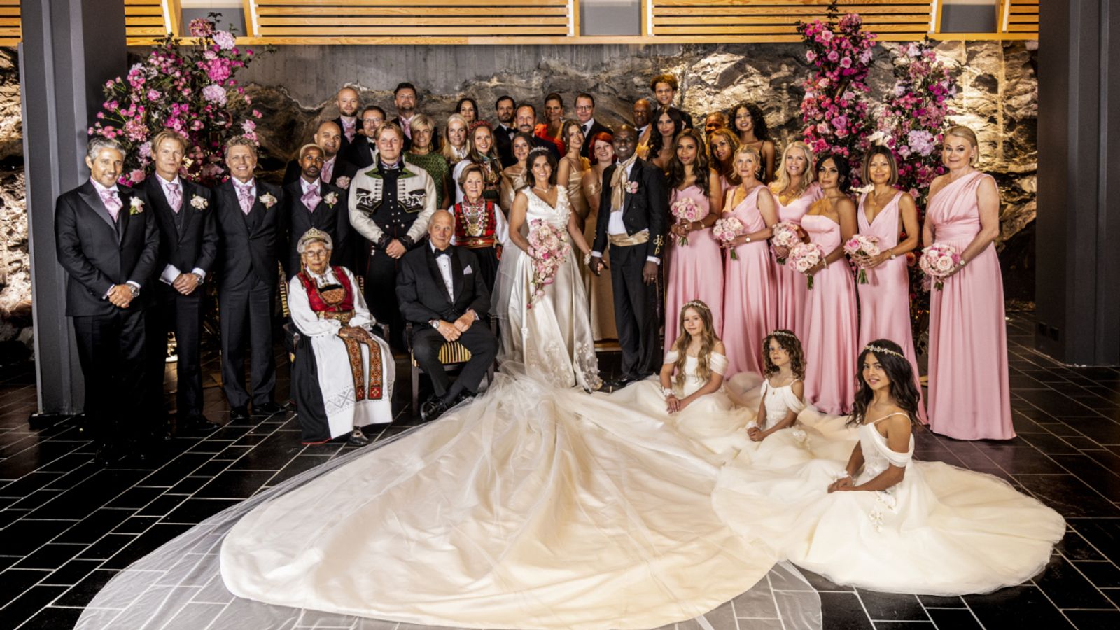 Norwegian royal family pose with Princess Martha Louise after she wed American shaman