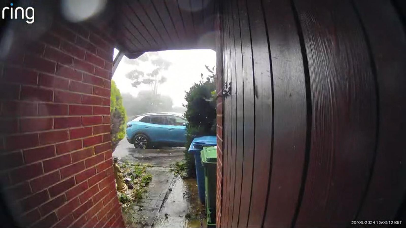 Tornado strikes Aldershot in Hampshire - bringing down trees, damaging buildings