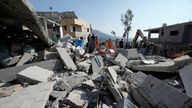 Emergency workers arrive at the scene of an Israeli airstrike in the town of Maisara, north of Beirut, Wednesday, Sept. 25, 2024. (AP Photo/Bilal Hussein)