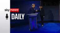 Kamala Harris walks to Donald Trump's podium for the handshake before the presidential debate.