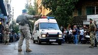 Lebanese army soldiers secure the area for an ambulance to enter the premises of the American University hospital, Beirut, yesterday.

 Eight people have been killed and some 2,750 injured in suspected coordinated explosions of hand-held telecommunications devices across Lebanon, Health Minister Firas Abiad said during a press conference in Beirut on 17 September. Photo by: Marwan Naamani/picture-alliance/dpa/AP Images