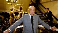 Harrods chairman Mohamed Al Fayed (C) unveils a memorial (L) to his son Dodi and Britain's Diana, Princess of Wales at Harrods in London, September 1, 2005. The new permanent memorial statue was unveiled on Thursday on the eighth anniversary of the deaths of Dodi and Diana in a car crash in Paris.
