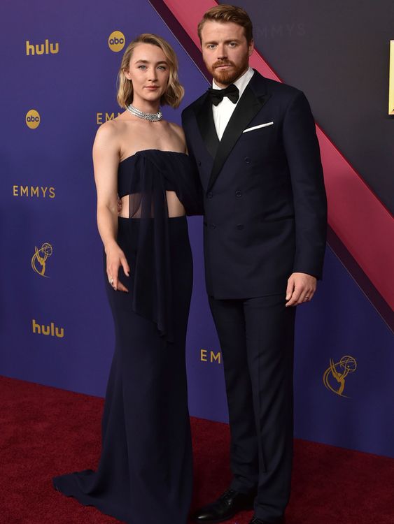 Saoirse Ronan, left, and Jack Lowden arrive at the 76th Primetime Emmy Awards on Sunday, Sept. 15, 2024, at the Peacock Theater in Los Angeles. (Photo by Richard Shotwell/Invision/AP)