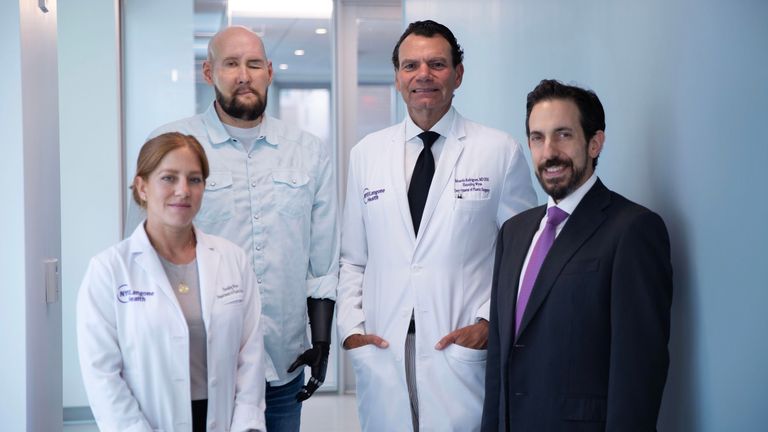 Aaron James (centre) with Dr Daniel Ceradini, Dr Eduardo Rodriguez (right) and nurse Allison Rojas in August 2024.
Pic: Haley Riccardi/NYU Langone Health/PA