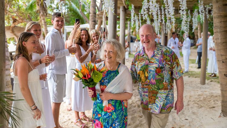 The couple are applauded after tying the knot. Pic: Mar Javierto
