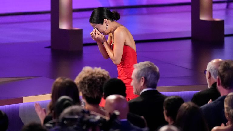 Anna Sawai wipes away tears as she accepts the award for Outstanding Lead Actress in a Drama Series for "Shogun" during the 76th Primetime Emmy Awards on Sunday, Sept. 15, 2024, at the Peacock Theater in Los Angeles. (AP Photo/Chris Pizzello)