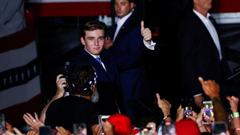 Barron William Trump, son of Republican presidential candidate and former U.S. President Donald Trump,gives a thumbs up at a campaign rally at Trump's golf resort in Doral, Florida, U.S., July 9, 2024. REUTERS/Marco Bello