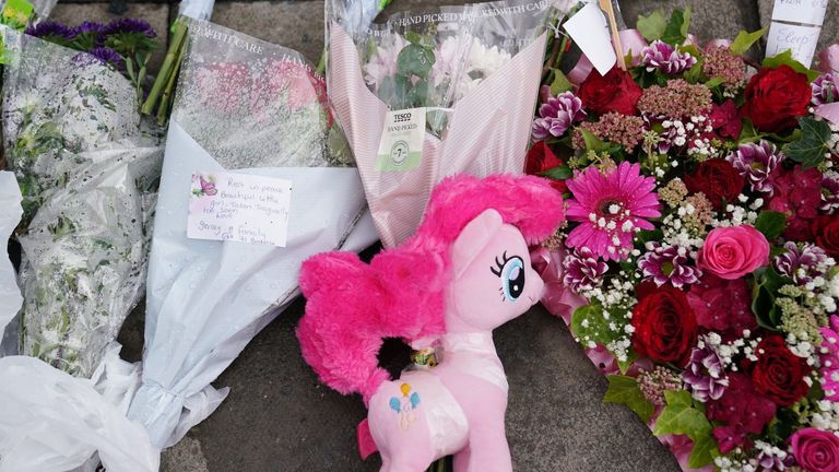 tributes left after a house fire in Bedale Drive, Leicester on 10/09/2024