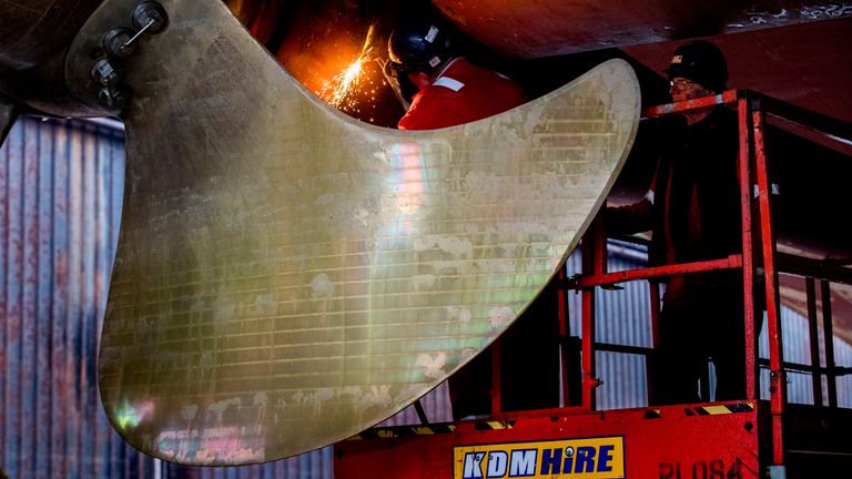 Joe Passmore looking on as workers at Harland and Wolff in Belfast begin work on the first ship to go through refit at the yard since the takeover by London-based energy company InfraStrata stepped in with a ??6m rescue deal that saved from yard from closure.