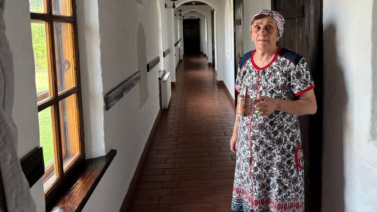 Lyudmila says drones were flying overhead as she and her family fled their home