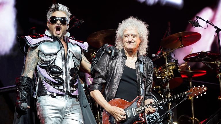 Adam Lambert, left, and Brian May of Queen perform during the "Rhapsody" tour on Monday, Oct. 30, 2023, at the United Center in Chicago. (Photo by Rob Grabowski/Invision/AP)


