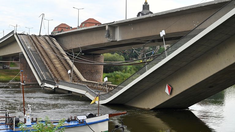 View of the broken part of the Carola Bridge (Carolabruecke) which collapsed into the Elbe, in Dresden, Germany September 11, 2024. REUTERS/Matthias Rietschel