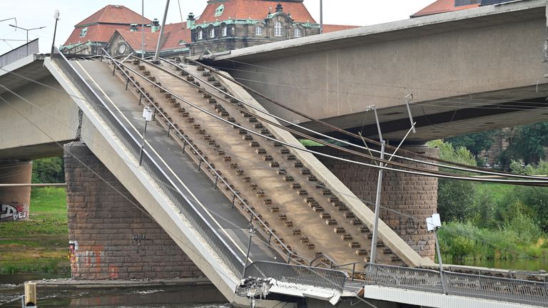 View of the broken part of the Carola Bridge (Carolabruecke) which collapsed into the Elbe, in Dresden, Germany September 11, 2024. REUTERS/Matthias Rietschel