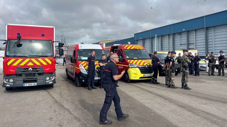 French rescue services are seen in the port of Boulogne-sur-Mer. Photo: Reuters