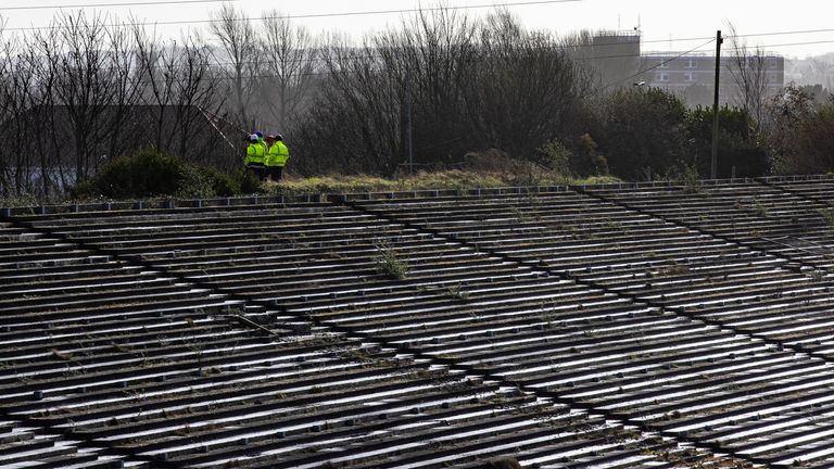 Workmen at Casement Park GAA stadium in Belfast, Northern Ireland. Contractors have begun assessing planned ground works at Casement Park ahead of the long-delayed redevelopment of the stadium.The maintenance and pre-enabling works will run until April, when the demolition of the existing terraces will begin. The GAA is undertaking the initial phase of works amid continued uncertainty over the funding of the redevelopment. The stadium in west Belfast has been earmarked for matches at the Euro 20