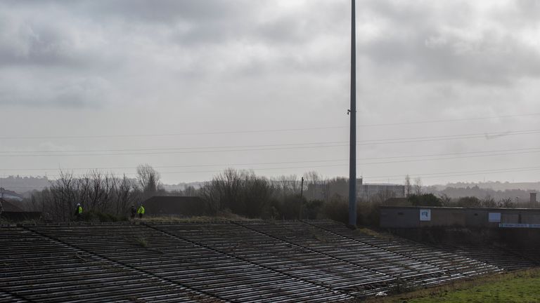 Workmen at Casement Park GAA stadium in Belfast, Northern Ireland. Contractors have begun assessing planned ground works at Casement Park ahead of the long-delayed redevelopment of the stadium.The maintenance and pre-enabling works will run until April, when the demolition of the existing terraces will begin. The GAA is undertaking the initial phase of works amid continued uncertainty over the funding of the redevelopment. The stadium in west Belfast has been earmarked for matches at the Euro 20