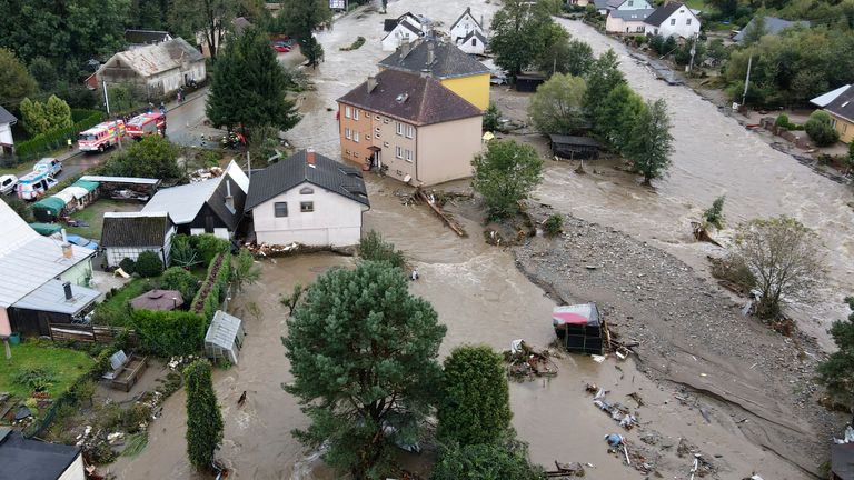 A view of flooded houses in Jesenik, Czech Republic, Sunday, Sept. 15, 2024. (AP Photo/Petr David Josek)