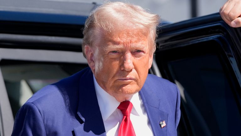 Republican presidential nominee former President Donald Trump arrives at Harry Reid International Airport to board a plane after a campaign trip, Saturday, Sept.14, 2024, in Las Vegas. (AP Photo/Alex Brandon)