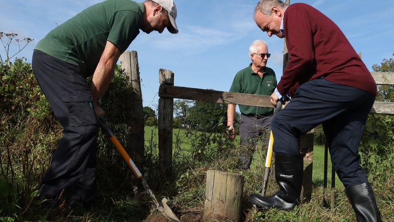 Ed Davey helps replace a stile in Ditchling during the party's autumn conference at the Brighton Centre in Brighton.
Pic: PA