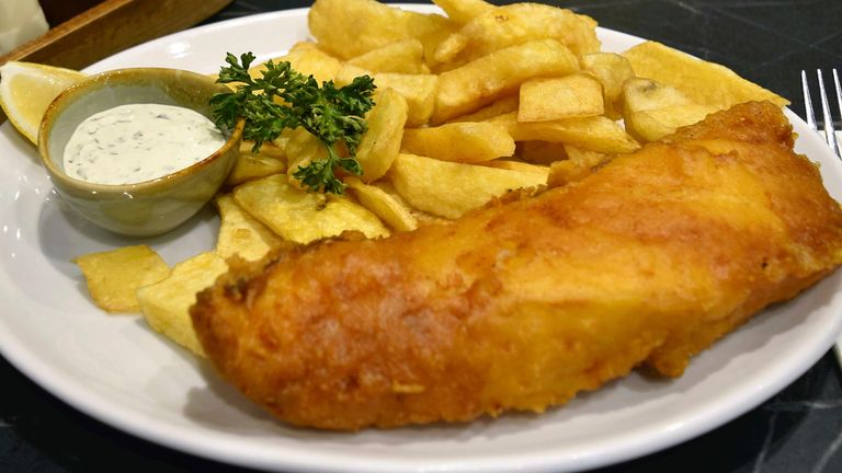 A picture shows fish and chips offered at a fish and chips restaurant ROCK & SOLE PLAICE in Covent Garden, London on Dec. 18, 2023. The restaurant which was established in 1871 is believed to be the oldest fish and chip restaurant to continue operating in the same location since its opening. The recipe has been passed down since the opening of the restaurant. ( The Yomiuri Shimbun via AP Images )